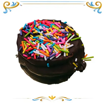 Relleno de dulce de leche, cubierto con chocolate y granas de colores